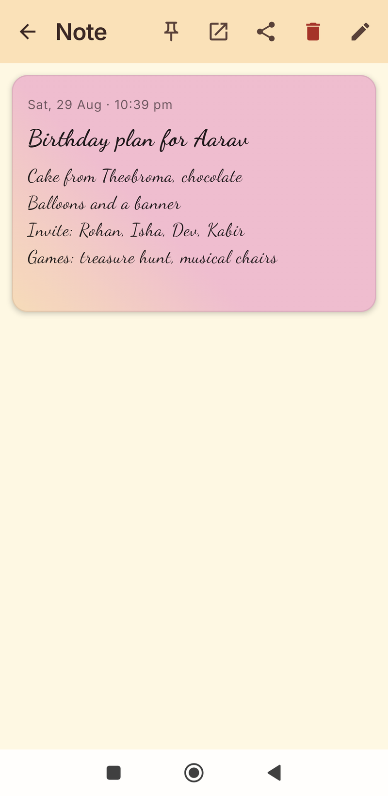 Pink gradient note in a cursive font with a gold washi tape strip
