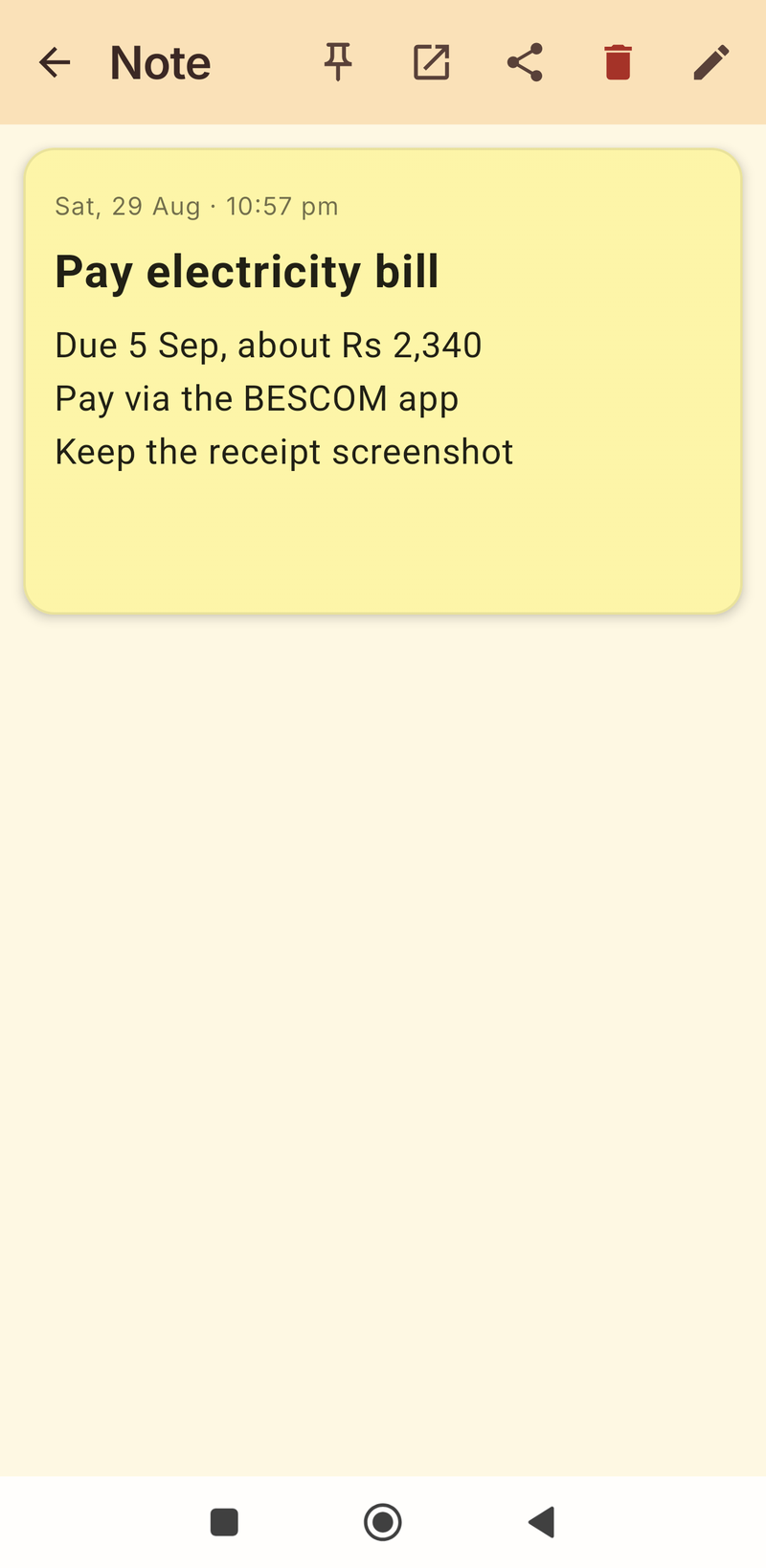Full-screen read view of a yellow note with pin, float, share, delete and edit actions